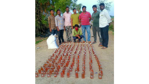 371 liquor bottles in the rice bags, 2 arrested 371 liquor bottles in the rice bags, 2 arrested