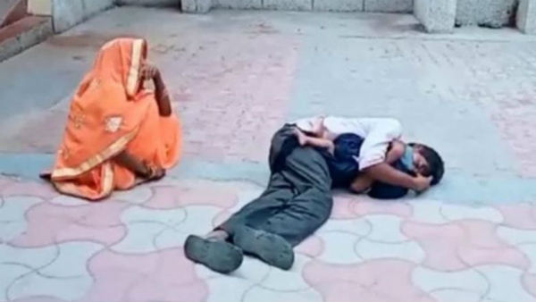కొడుకు మృతదేహాన్ని గుండెలకు హత్తుకుని...