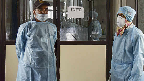krishna district police file cases on two nri covid 19 patients escape from quarantine krishna district police file cases on two nri covid 19 patients escape from quarantine