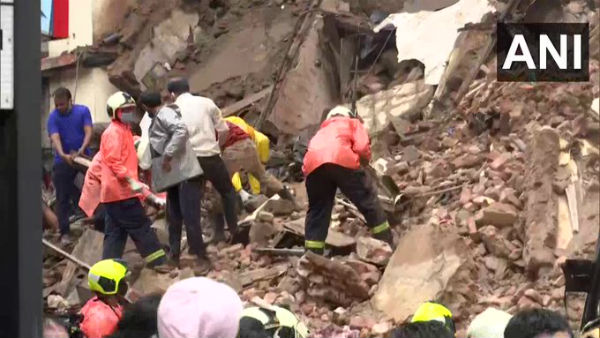 Heavy rains in Mumbai led to two building collapses in two different areas of the city today. Heavy rains in Mumbai led to two building collapses in two different areas of the city today.