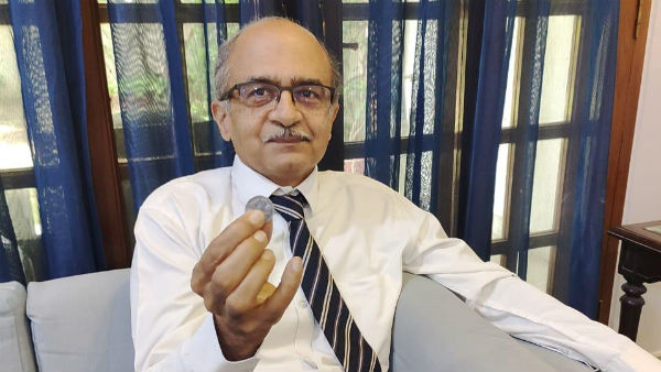 prashant bhushan acquires 1 rupee fine amount as donation from collegue rajeev dhawan prashant bhushan acquires 1 rupee fine amount as donation from collegue rajeev dhawan