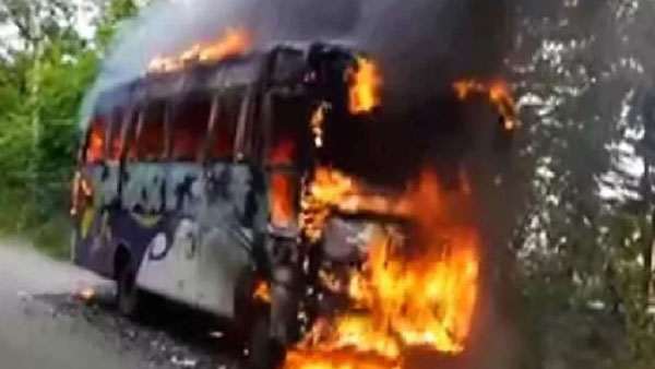 Fire breaks out in a sckdt private bus after tire bursts near Vijayawada Fire breaks out in a sckdt private bus after tire bursts near Vijayawada