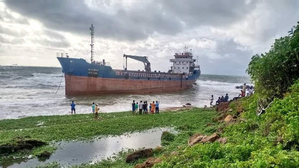 Heavy rains in Visakhapatnam: A ship drifted onto the shore at Tenneti Park in Vizag Heavy rains in Visakhapatnam: A ship drifted onto the shore at Tenneti Park in Vizag