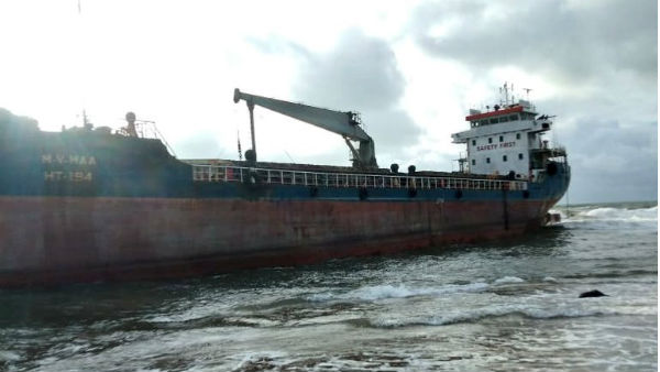 Heavy rains in Visakhapatnam: A ship drifted onto the shore at Tenneti Park in Vizag Heavy rains in Visakhapatnam: A ship drifted onto the shore at Tenneti Park in Vizag
