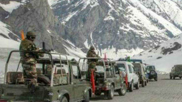 Chinese soldier, held by Army after he strayed across LAC in Ladakh, handed back to PLA Chinese soldier, held by Army after he strayed across LAC in Ladakh, handed back to PLA