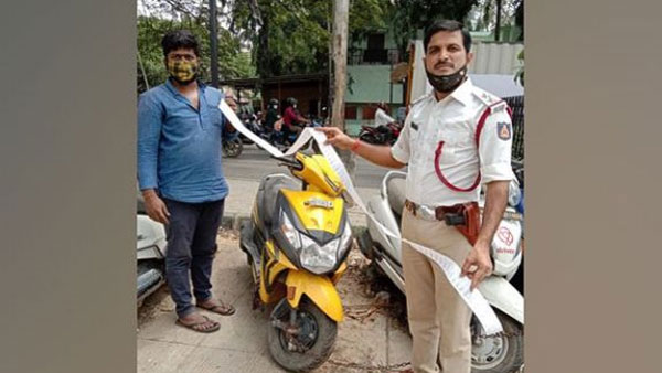 Facing Rs 42,000 in traffic fines, Bengaluru vegetable vendor hands over bike to police Facing Rs 42,000 in traffic fines, Bengaluru vegetable vendor hands over bike to police