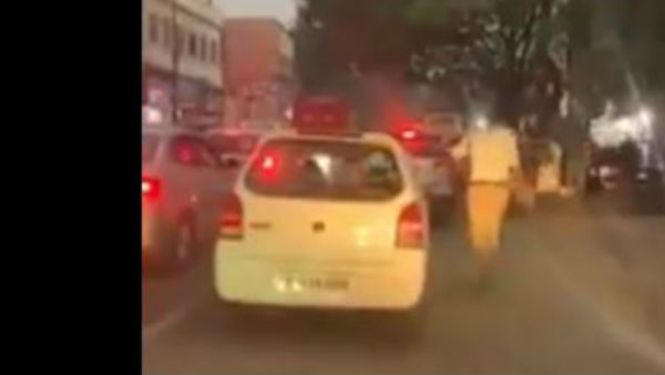 Hyderabad cop runs 2 km to clear traffic jam and make way for ambulance Hyderabad cop runs 2 km to clear traffic jam and make way for ambulance