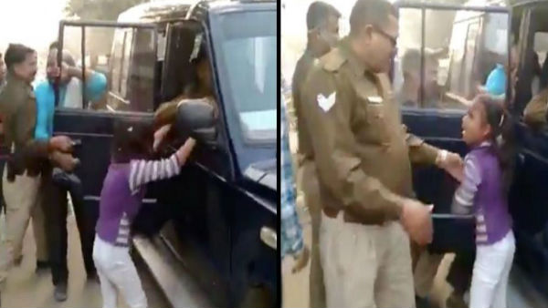 UP cops arrest cracker seller; young girl desperately begs police to release her father UP cops arrest cracker seller; young girl desperately begs police to release her father