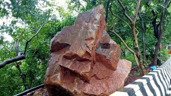 Landslide on Second Ghat Road of Tirumala, TTD Officials the removing boulders Landslide on Second Ghat Road of Tirumala, TTD Officials the removing boulders