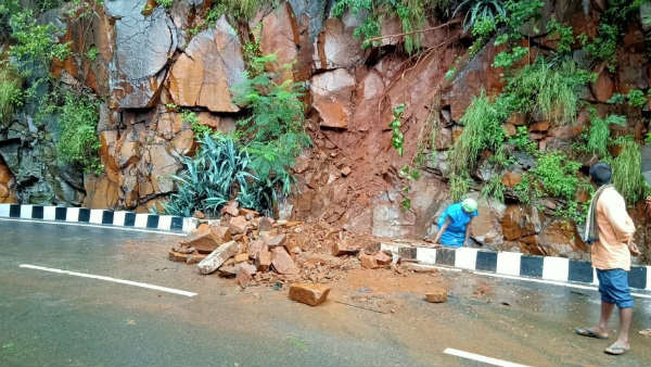 Landslide on Second Ghat Road of Tirumala, TTD Officials the removing boulders Landslide on Second Ghat Road of Tirumala, TTD Officials the removing boulders