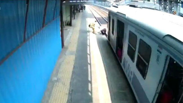 Mumbai cop saves elderly man from getting crushed under train at Dahisar Railway Station, slaps him later Mumbai cop saves elderly man from getting crushed under train at Dahisar Railway Station, slaps him later