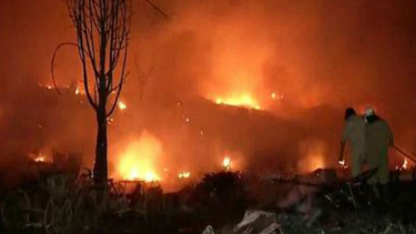 20 fire engines are at the spot trying to bring the fire under control 20 fire engines are at the spot trying to bring the fire under control
