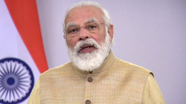 Before elections PM Modi Distributes Land Papers to Assams Indigenous Families Before elections PM Modi Distributes Land Papers to Assams Indigenous Families