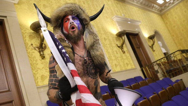 Violence at US Capitol: Trump supporter in horns and fur is charged Violence at US Capitol: Trump supporter in horns and fur is charged