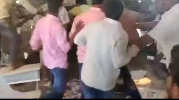 ysrcp and tdp workers attacked each other in polling booth in vizianagaram ysrcp and tdp workers attacked each other in polling booth in vizianagaram