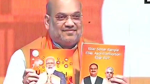 Amit Shah Releases BJPs Manifesto; Promises CAA, 33% Women Reservation Amit Shah Releases BJPs Manifesto; Promises CAA, 33% Women Reservation