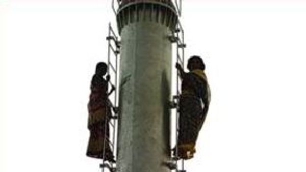 two women climbs cell phone tower to demanding its removal two women climbs cell phone tower to demanding its removal