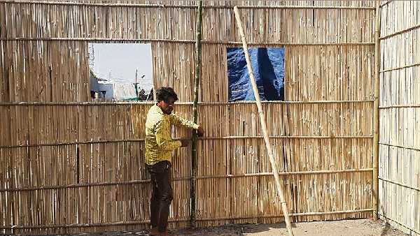 Farmers set up huts made of bamboo to beat the heat in Delhi Farmers set up huts made of bamboo to beat the heat in Delhi