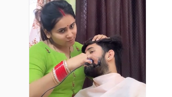 Wife shaves her husbands beard-Viral video Wife shaves her husbands beard-Viral video