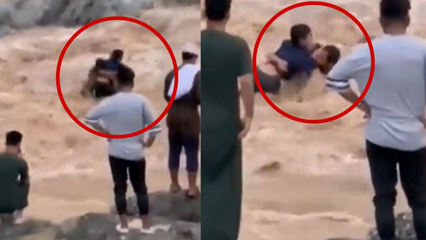 Viral Video: Omani hailed as hero after he saves two children from drowning in flash floods Viral Video: Omani hailed as hero after he saves two children from drowning in flash floods