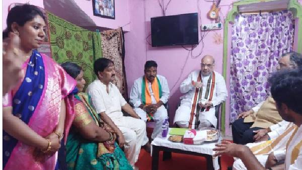 దళిత బీజేపీ కార్యకర్తలో ఇంట్లో అమిత్ షా: భావోద్వేగానికి గురైన సత్యనారాయణ ఫ్యామిలీ