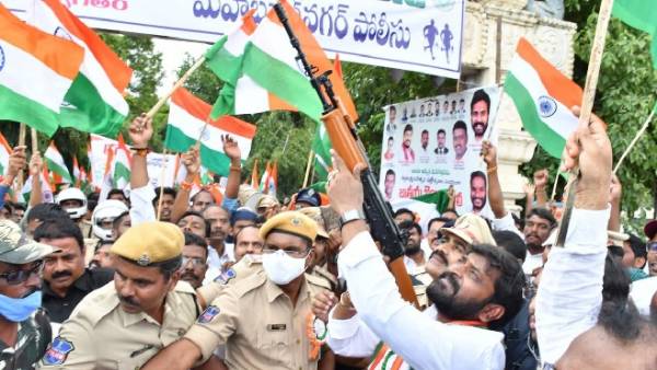 minister srinivas goud fires in air with police weapon minister srinivas goud fires in air with police weapon