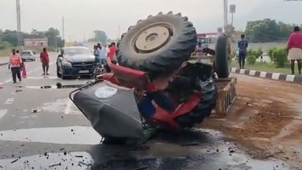 Tractor brokes into two pieces after collide with a Benz car near Tirupati Tractor brokes into two pieces after collide with a Benz car near Tirupati