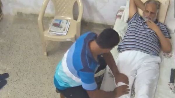 Viral Video: Jailed Delhi minister and AAP leader Satyendar Jain getting a massage inside Tihar jail Viral Video: Jailed Delhi minister and AAP leader Satyendar Jain getting a massage inside Tihar jail
