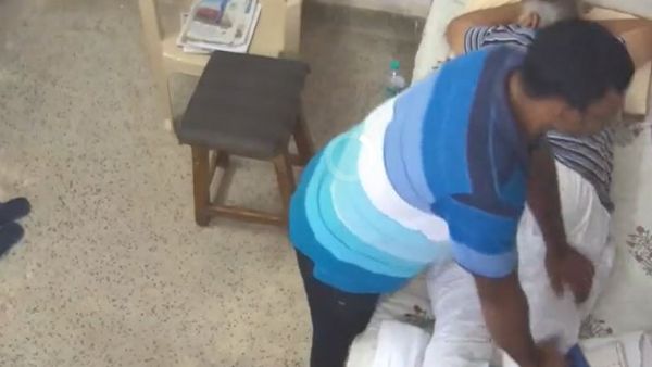 Viral Video: Jailed Delhi minister and AAP leader Satyendar Jain getting a massage inside Tihar jail Viral Video: Jailed Delhi minister and AAP leader Satyendar Jain getting a massage inside Tihar jail