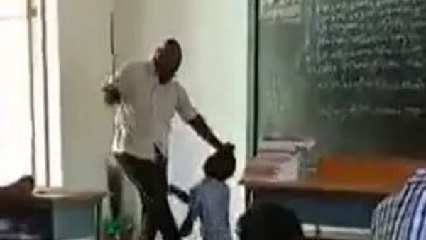 students beat a another one at room students beat a another one at room
