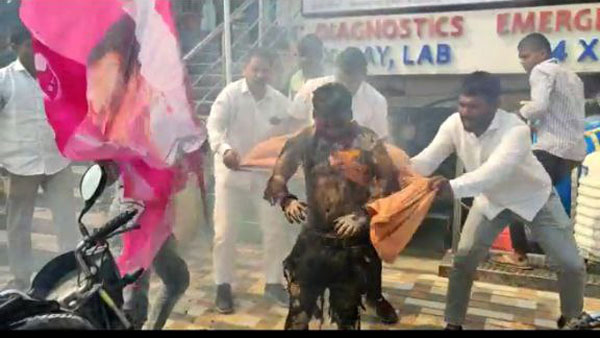 Auto driver critically injured in Telanganas Sangareddy during TRS workers bursted crackers Auto driver critically injured in Telanganas Sangareddy during TRS workers bursted crackers